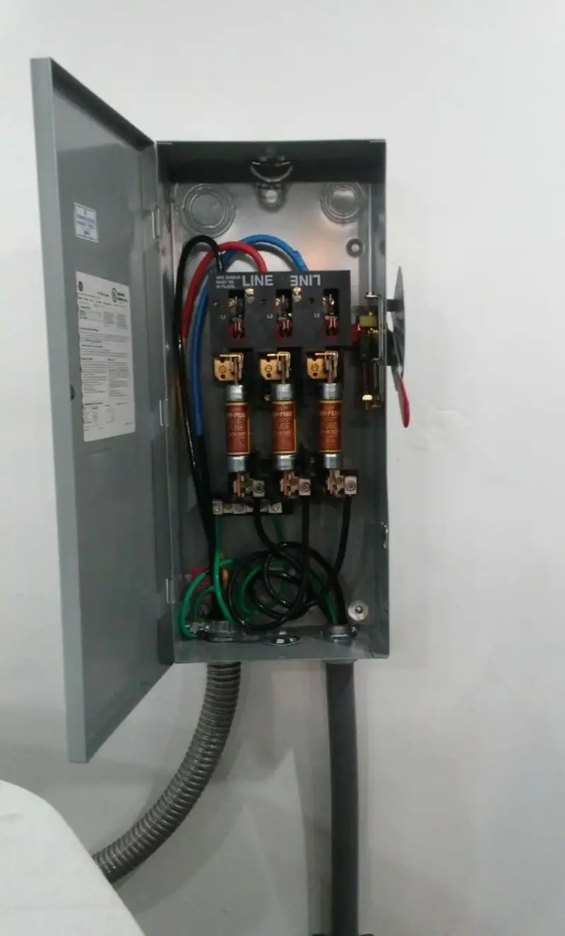 Three-phase disconnect switch installed for Smoke Detector Installation in Randolph